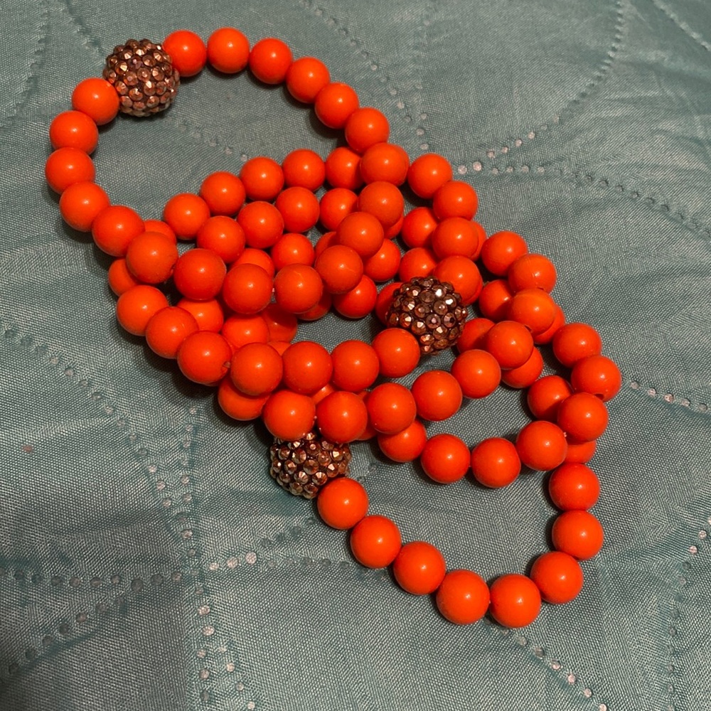 Set of 5 orange bead bracelets 3 have glitter balls champagne color